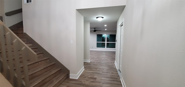 corridor featuring hardwood / wood-style floors