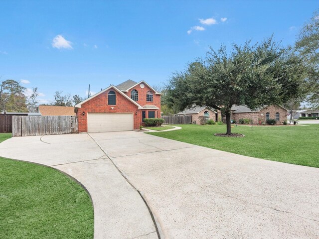 view of front facade with a garage and a front lawn