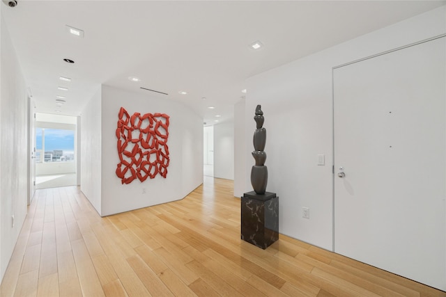 hallway featuring hardwood / wood-style floors