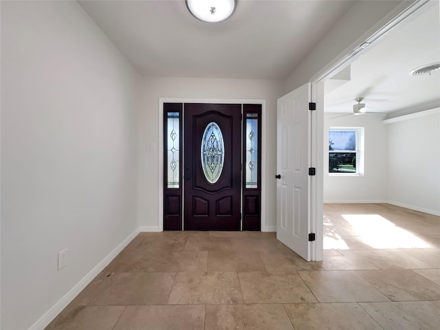 foyer with ceiling fan