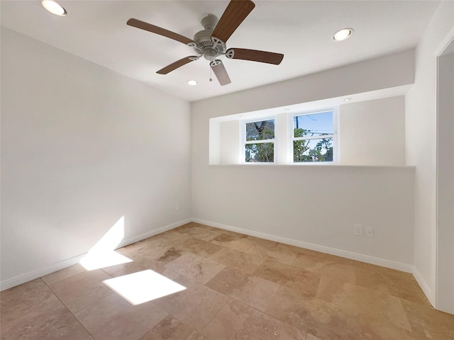 unfurnished room featuring ceiling fan