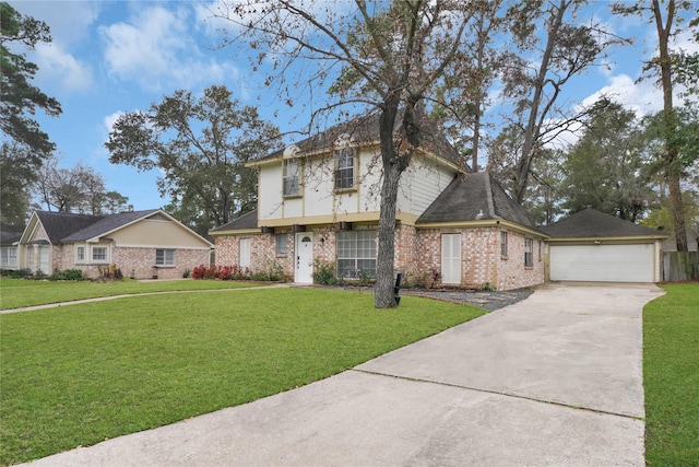 view of front of property featuring a front yard and a garage