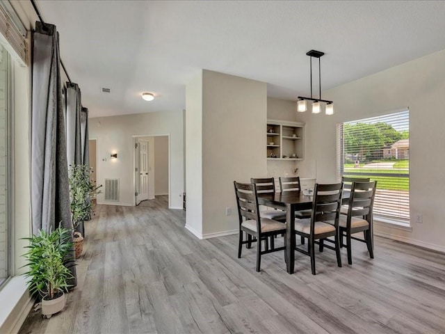 dining room featuring light wood-type flooring