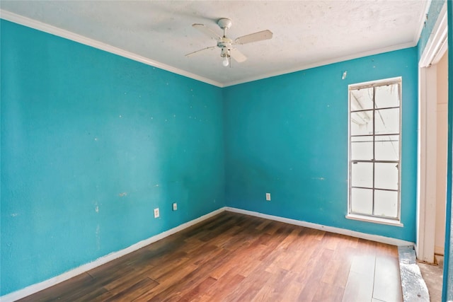 unfurnished room featuring hardwood / wood-style floors, ceiling fan, and ornamental molding