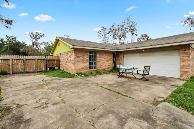 view of patio / terrace with a garage