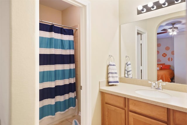 bathroom featuring vanity, tile patterned floors, and ceiling fan