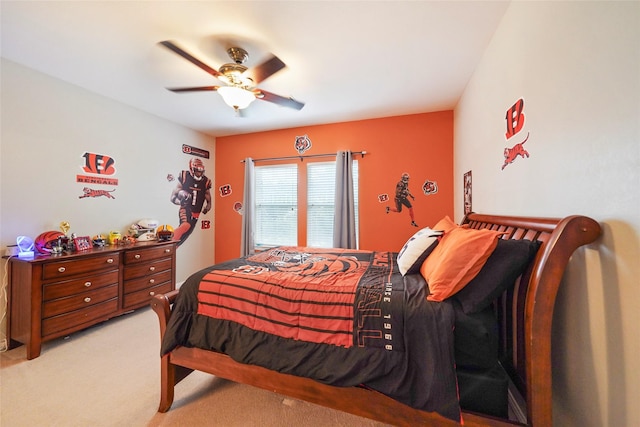 carpeted bedroom with ceiling fan