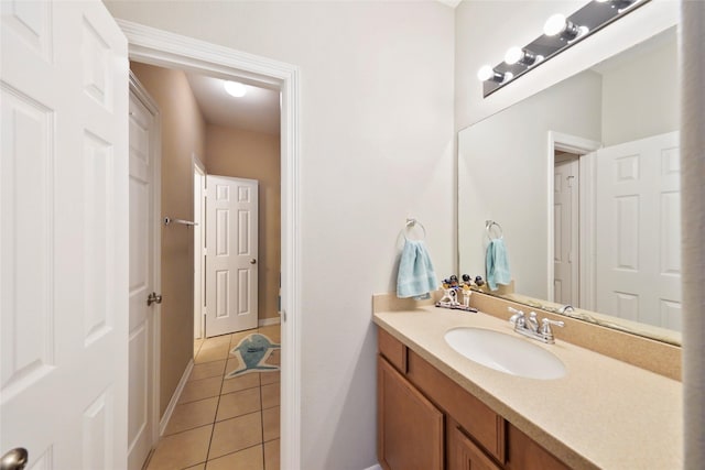 bathroom featuring tile patterned floors and vanity