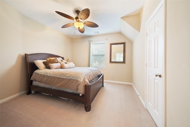 bedroom featuring ceiling fan and light carpet