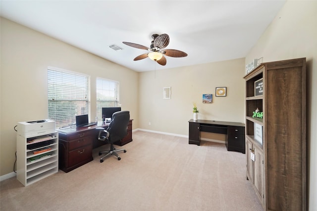 home office with light colored carpet and ceiling fan