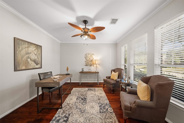 home office with crown molding, dark wood-type flooring, and ceiling fan