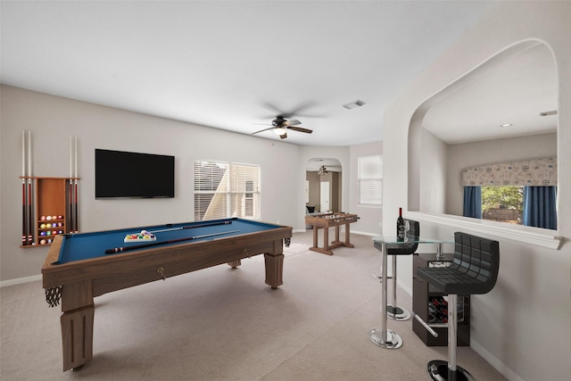 rec room with pool table, light colored carpet, and ceiling fan