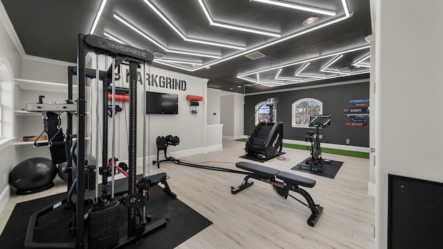 workout area with hardwood / wood-style floors and plenty of natural light