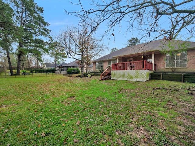 view of yard with a deck