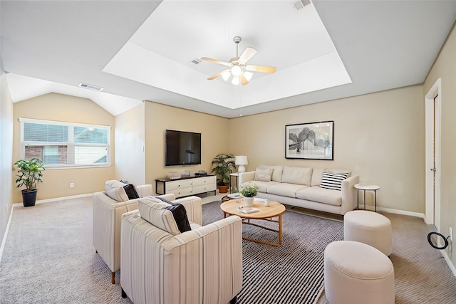 carpeted living room featuring ceiling fan