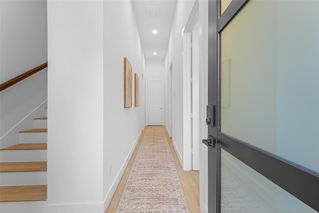 hall featuring light wood-type flooring