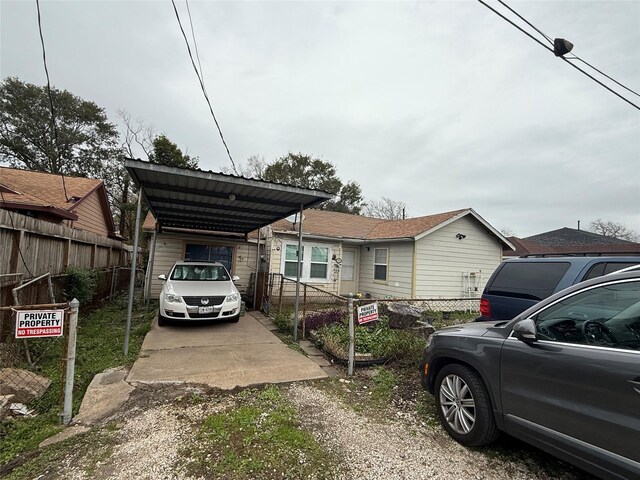 view of front of property with a carport