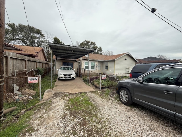 view of front of house with a carport