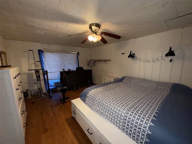 bedroom featuring ceiling fan and hardwood / wood-style floors