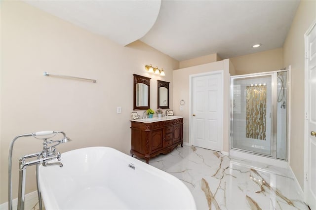 bathroom featuring shower with separate bathtub and vanity