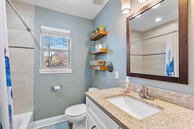 full bathroom featuring vanity, toilet, and shower / tub combo