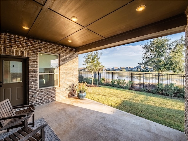 view of patio / terrace featuring a water view