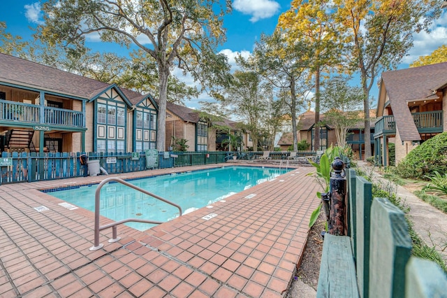 view of pool featuring a patio area