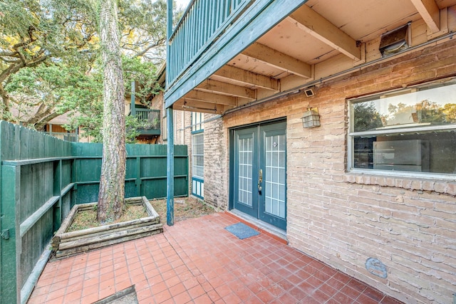 view of patio featuring french doors