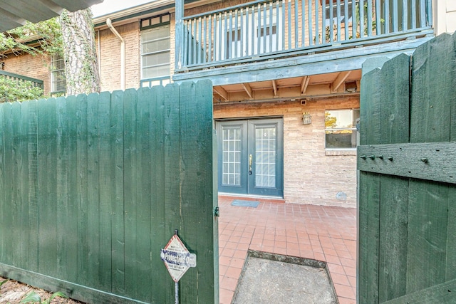 doorway to property featuring french doors and a balcony