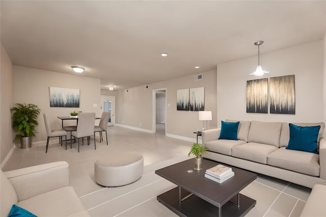 living room featuring light tile patterned floors