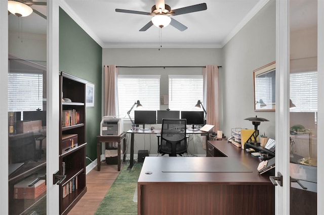 office space with hardwood / wood-style floors, ceiling fan, crown molding, and french doors