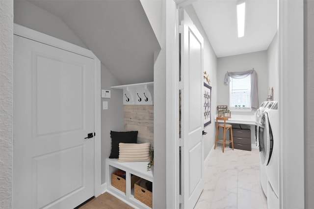 mudroom with washing machine and clothes dryer