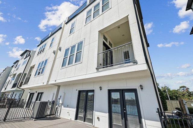 view of building exterior with cooling unit