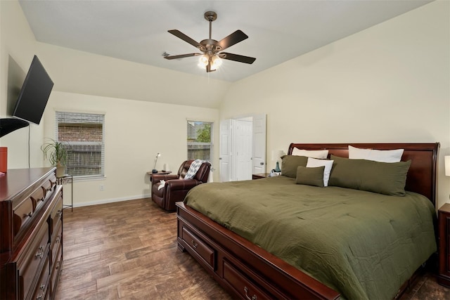 bedroom featuring lofted ceiling, ceiling fan, and dark hardwood / wood-style floors