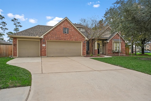 front facade with a garage and a front lawn