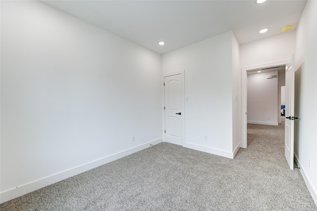 unfurnished bedroom with light colored carpet