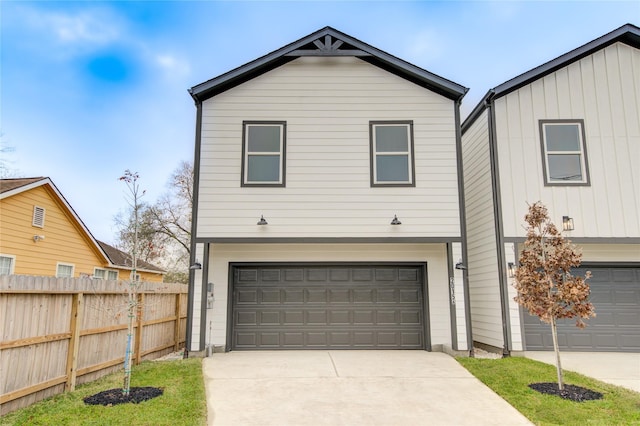 view of front of property with a garage