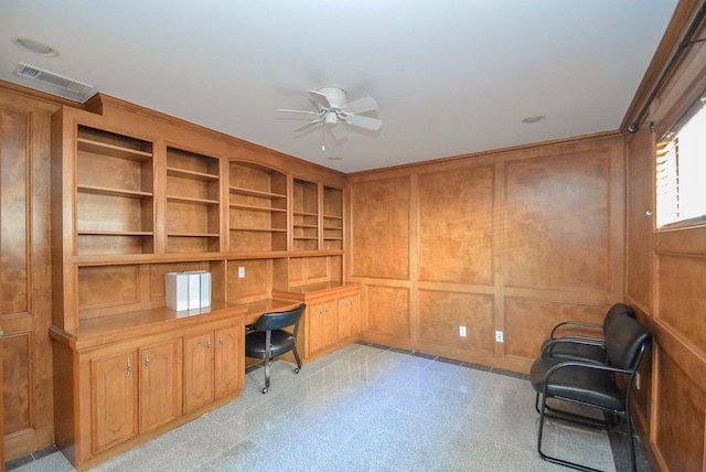 home office featuring ceiling fan, built in features, and built in desk