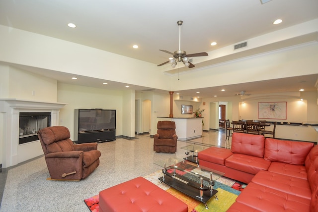 living room featuring ceiling fan