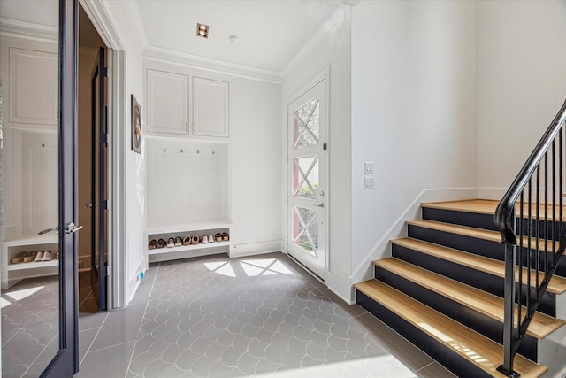 mudroom featuring crown molding