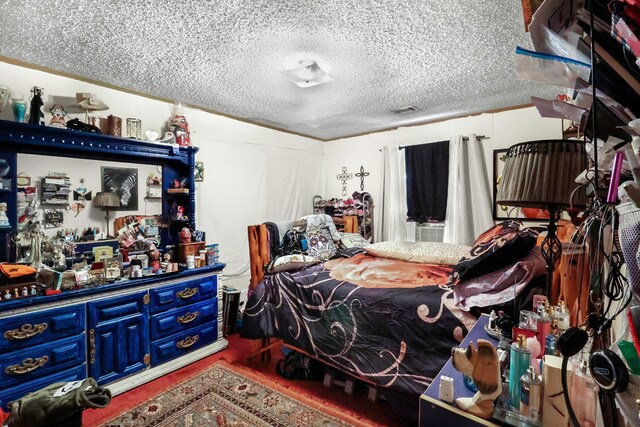 bedroom with a textured ceiling