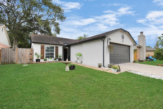 single story home with a front yard and a garage