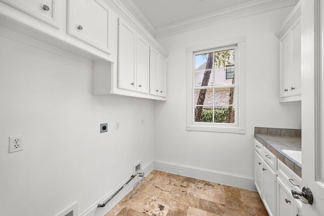 washroom featuring washer hookup, cabinets, electric dryer hookup, hookup for a gas dryer, and ornamental molding