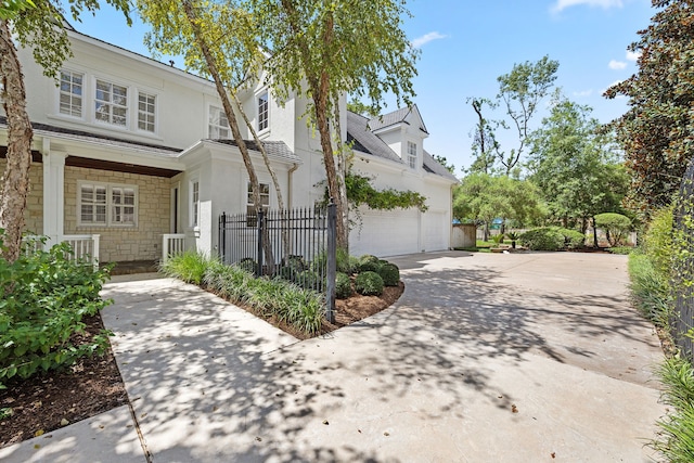 front facade with a garage