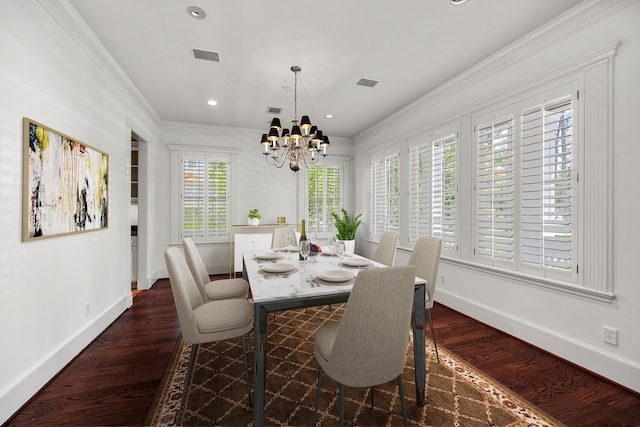 dining area with a notable chandelier, dark hardwood / wood-style flooring, and crown molding