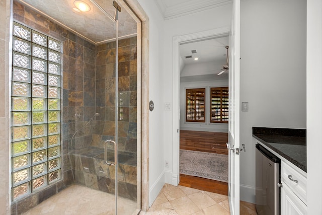 bathroom featuring tile patterned floors, ceiling fan, a healthy amount of sunlight, and walk in shower