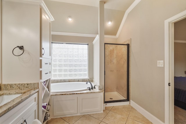 bathroom featuring tile patterned flooring, lofted ceiling, ornamental molding, and independent shower and bath