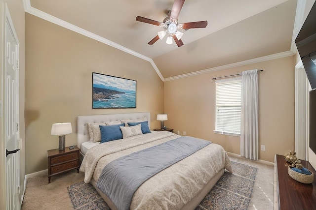 carpeted bedroom with ceiling fan, lofted ceiling, and ornamental molding