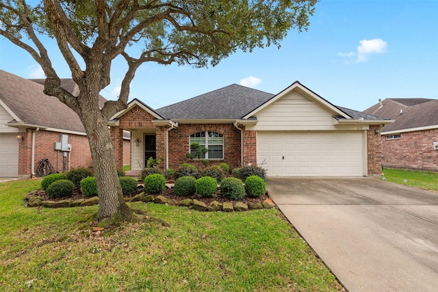 ranch-style house featuring a front yard and a garage