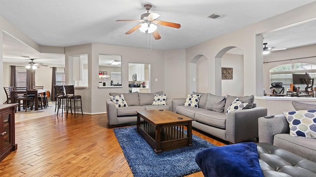 living room with light hardwood / wood-style flooring